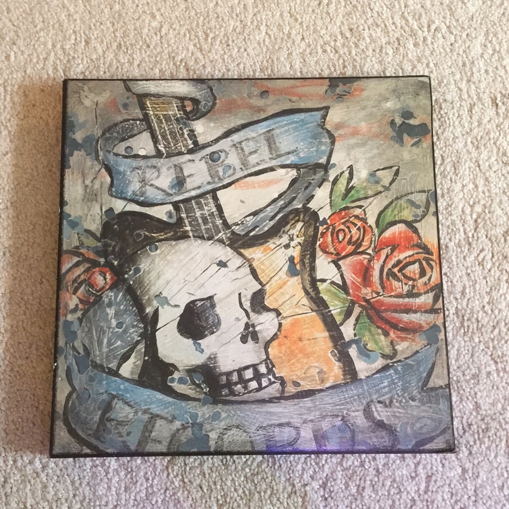 Skull and guitar wall decor